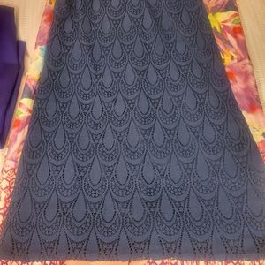 Lilly Pulitzer blue slip on, eyelet mini.